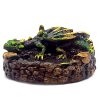 Handcrafted round incense holder ash tray with a 3D figurine of a laying dragon in green, brown, black, and gold color combination.