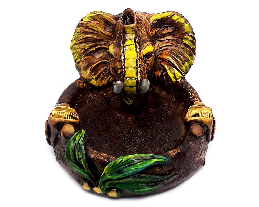 Handcrafted round incense holder ash tray with a leaf design and 3D figurine of an elephant head in yellow, beige, green, brown, black, and gold color combination.