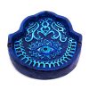 Handcrafted Hamsa hand-shaped flat incense holder ash tray with evil eye design in blue, turquoise, and light blue color combination.