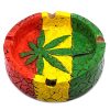 Handcrafted round-shaped flat incense holder ash tray with Rasta-colored mosaic tile design and cannabis pot leaf in green, yellow, and red color combination.