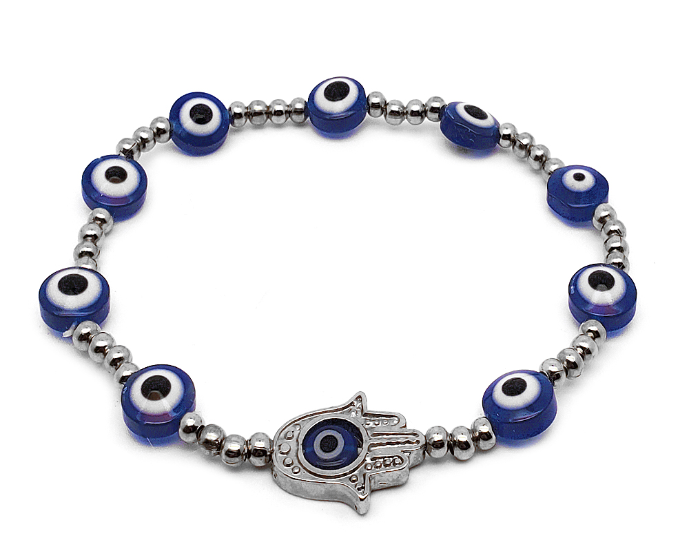 Handmade metal hamsa hand charm, evil eye bead, and seed bead stretchy bracelet in blue, silver, black, and white color combination.