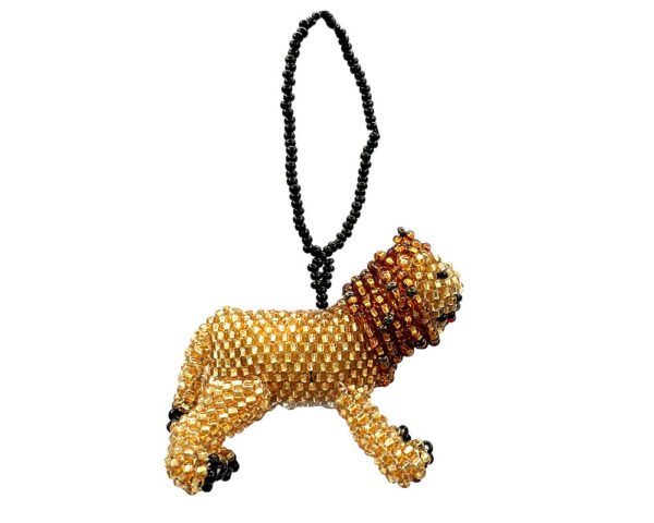 Handmade Czech glass seed bead animal figurine hanging ornament of a lion in gold, brown, and black color combination.
