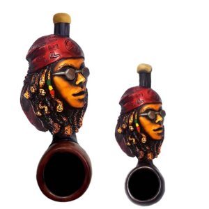 Handcrafted tobacco smoking hand pipe of a Rasta woman with bandana and sunglasses in both mini and small sizes.