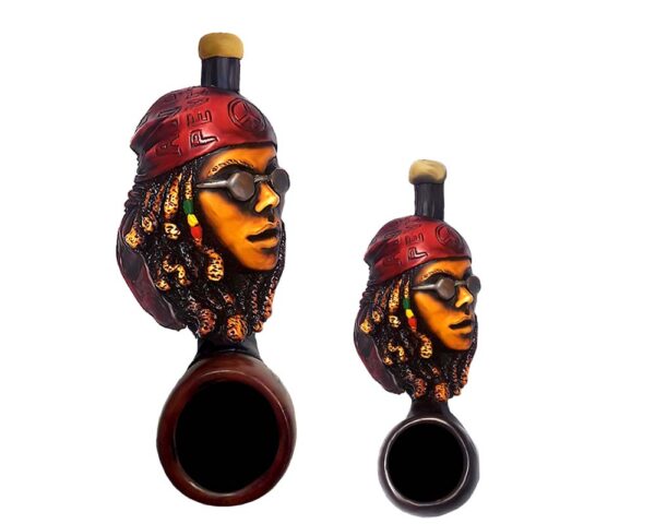 Handcrafted tobacco smoking hand pipe of a Rasta woman with bandana and sunglasses in both mini and small sizes.
