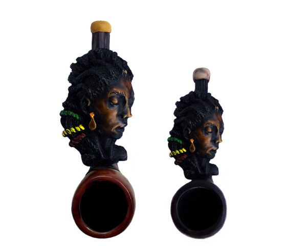 Handcrafted tobacco smoking hand pipe of a Rasta woman with dreads in both mini and small sizes.