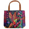 Handmade extra large tote purse bag with multicolored embroidered hummingbird and floral designs and brown vegan leather suede handle in assorted colors. Color will vary from examples in image.