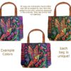 Handmade extra large tote purse bag with multicolored embroidered hummingbird and floral designs and brown vegan leather suede handle in assorted colors. Color will vary from examples in image.