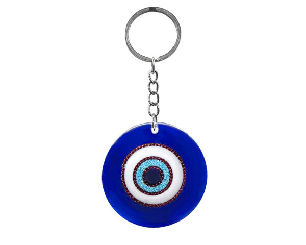 Handmade round clear acrylic resin, copper wire, and crushed chip stone inlay evil eye keychain on silver metal key ring in purple, light blue turquoise, brown, black, and white color combination.