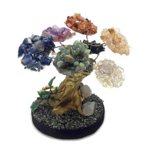Handmade chip stone crystal tree of life table ornament with gold-colored trunk and crushed pyrite round stone base in 7 chakra rainbow color combination.