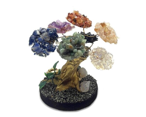 Handmade chip stone crystal tree of life table ornament with gold-colored trunk and crushed pyrite round stone base in 7 chakra rainbow color combination.